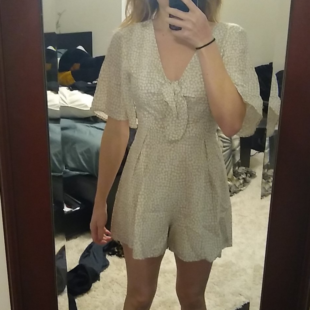 Tan/cream with white polka dots romper